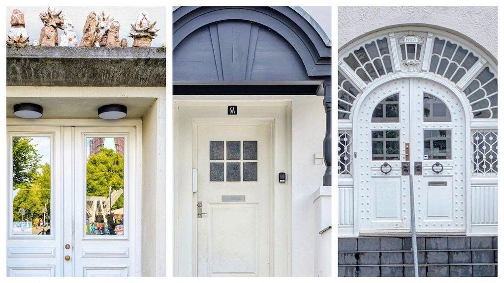 A vertical collage of three minimalist white entryways in Copenhagen. The first shows double doors reflecting a green park, topped by a concrete ledge with several small, abstract stone sculptures. The middle features a single white door with a six-pane window, sheltered by a heavy charcoal-grey arched portico. The third displays symmetrical riveted double doors under a large semi-circular transom window with a decorative sunburst design.